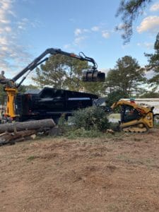 Team working to dispose of debris